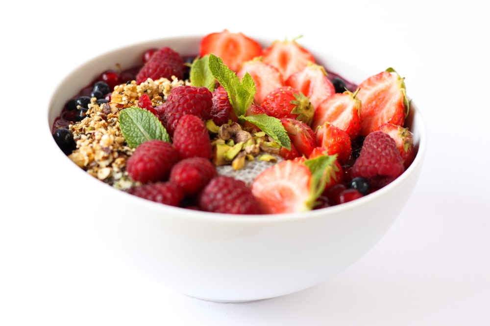 strawberries in white ceramic bowl