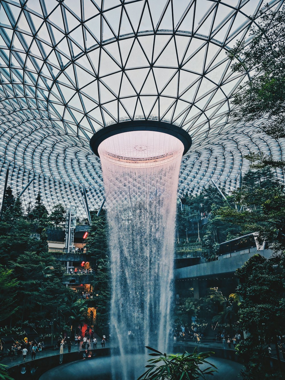 water fountain in the middle of the garden