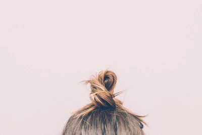 brown and black hair on white background