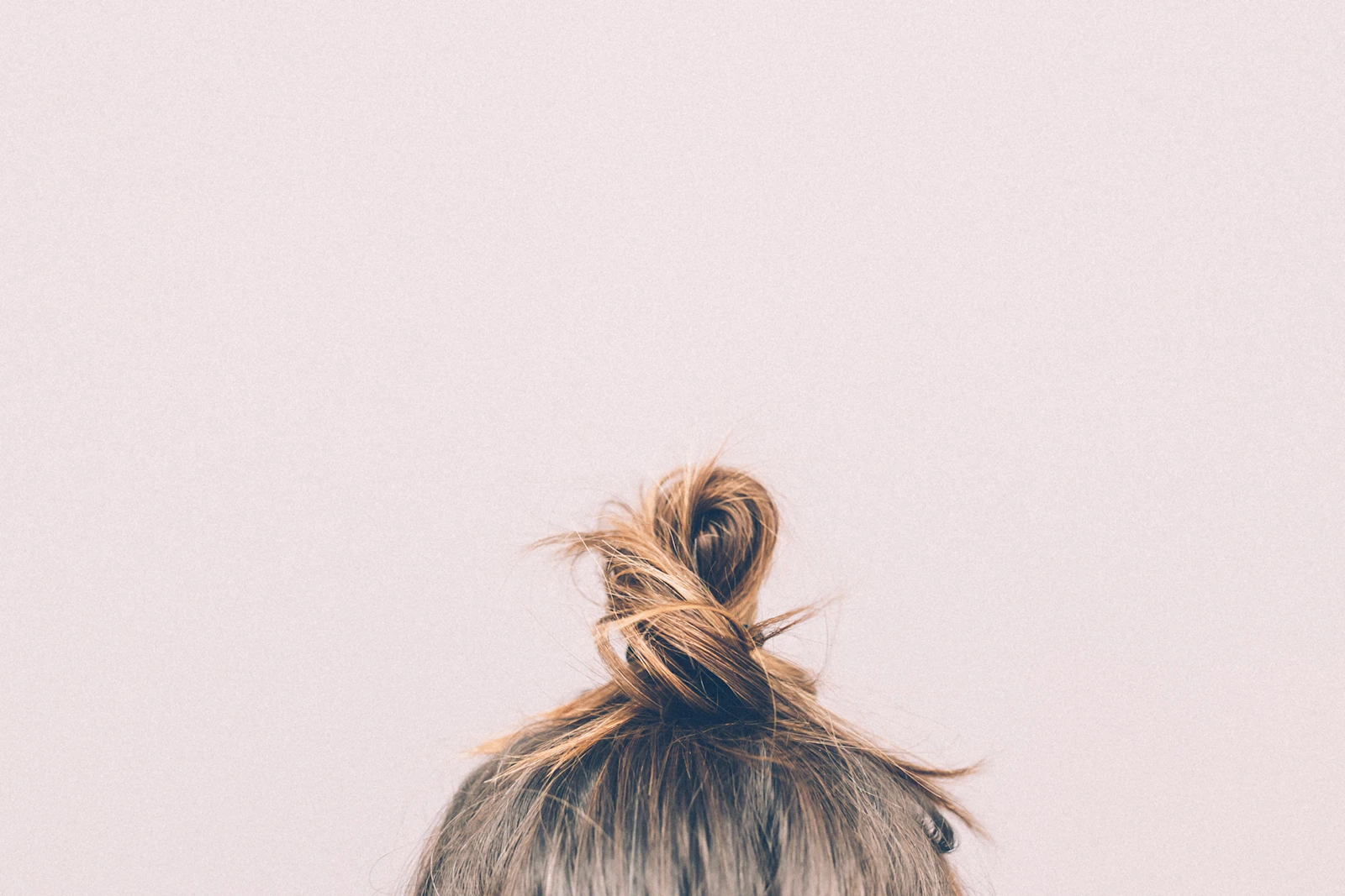 A close view of hair texture and bun shape