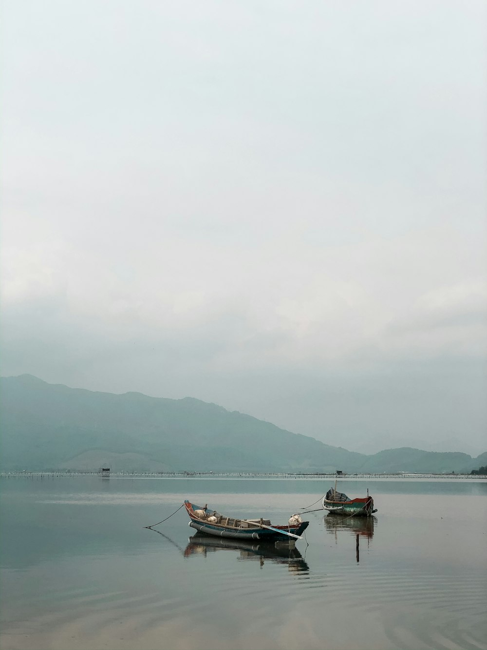 brown boat on body of water during daytime