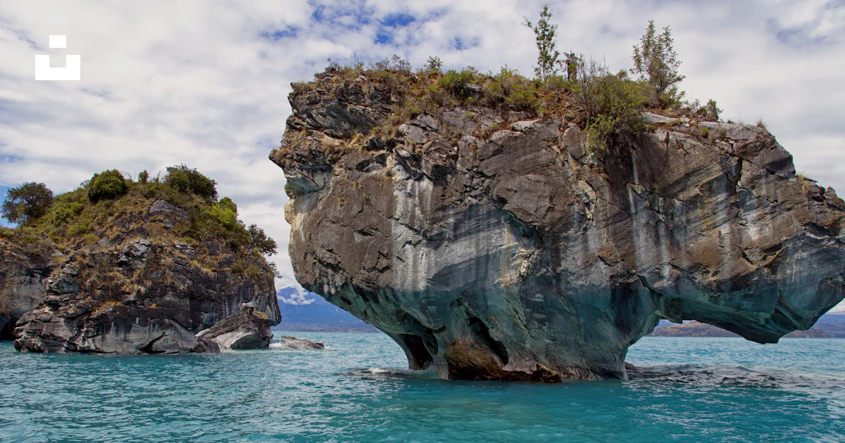 Chile Rocks Zoomed In Brown rock formation on body of water during daytime photo – Free ...