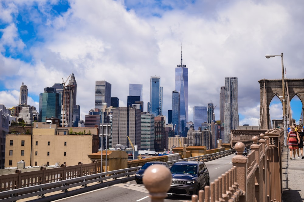 city buildings under white clouds during daytime