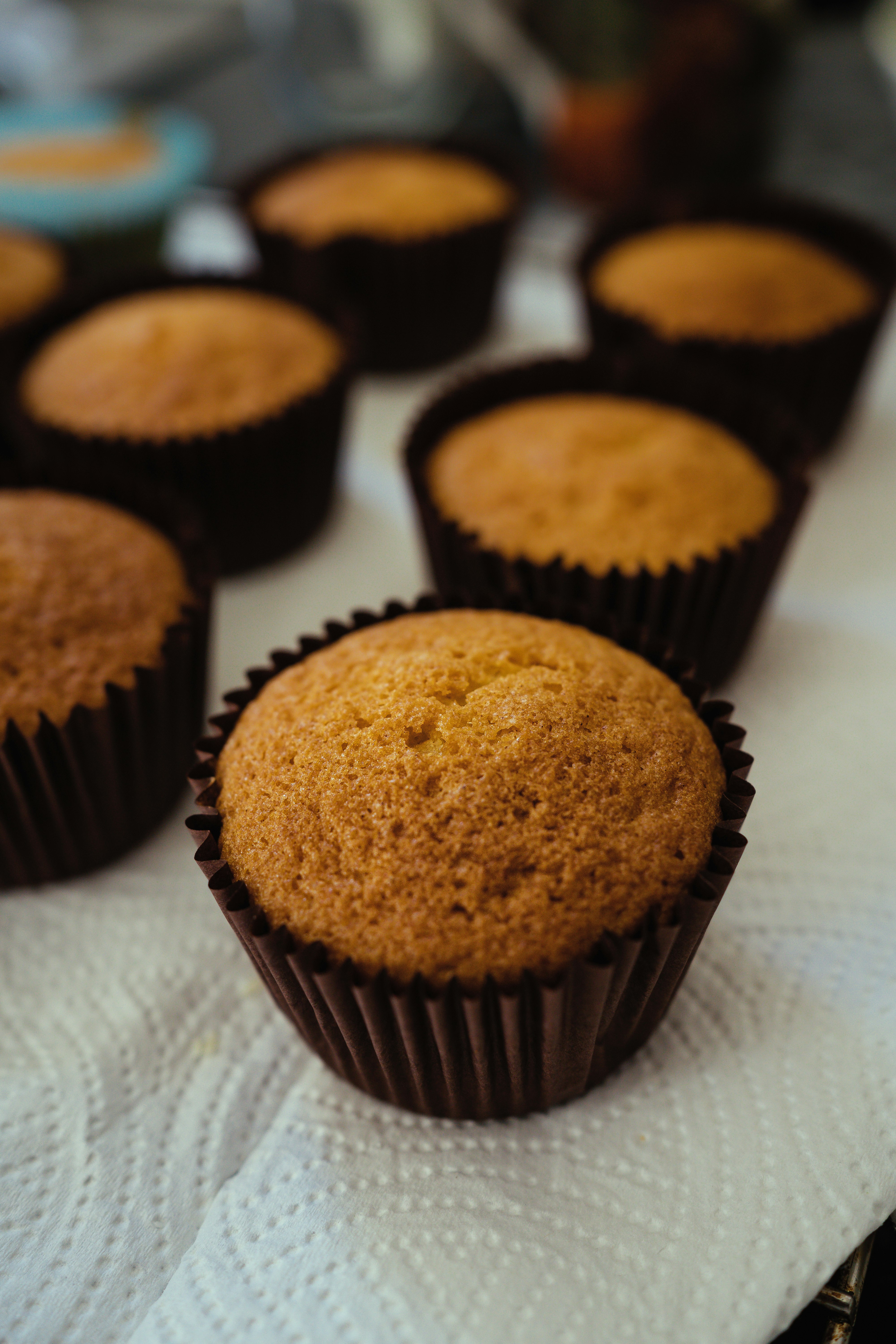 brown cupcake on white paper towel