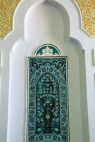 An artistic wall paneling design that enhances the room's aesthetics.