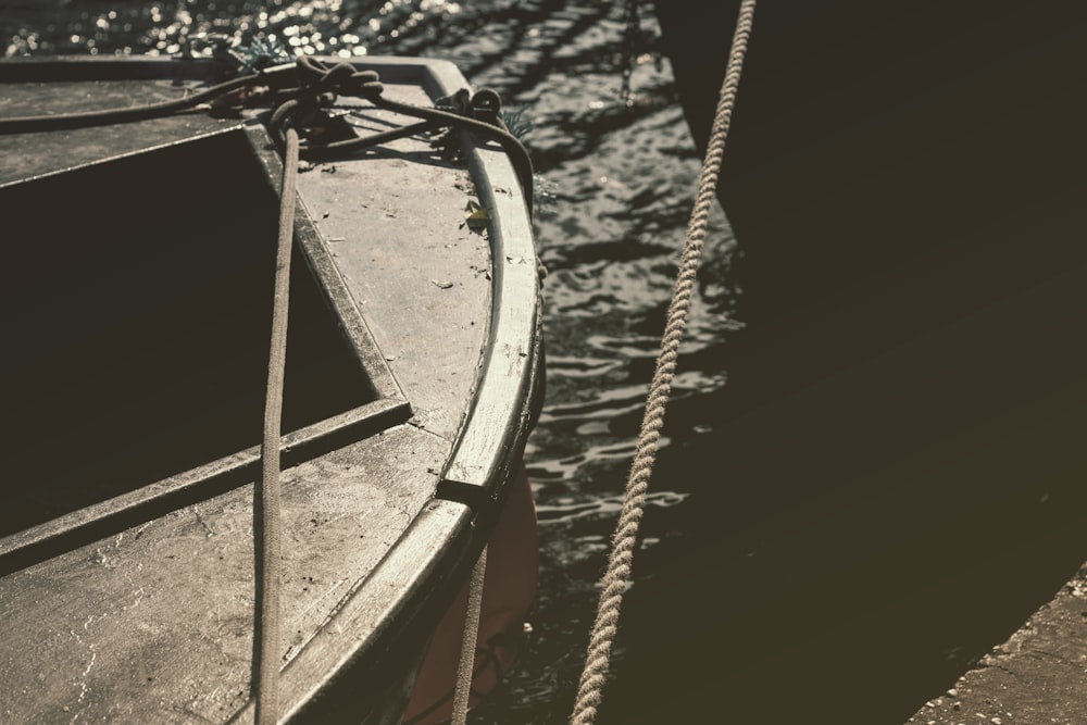 grayscale photo of boat on water