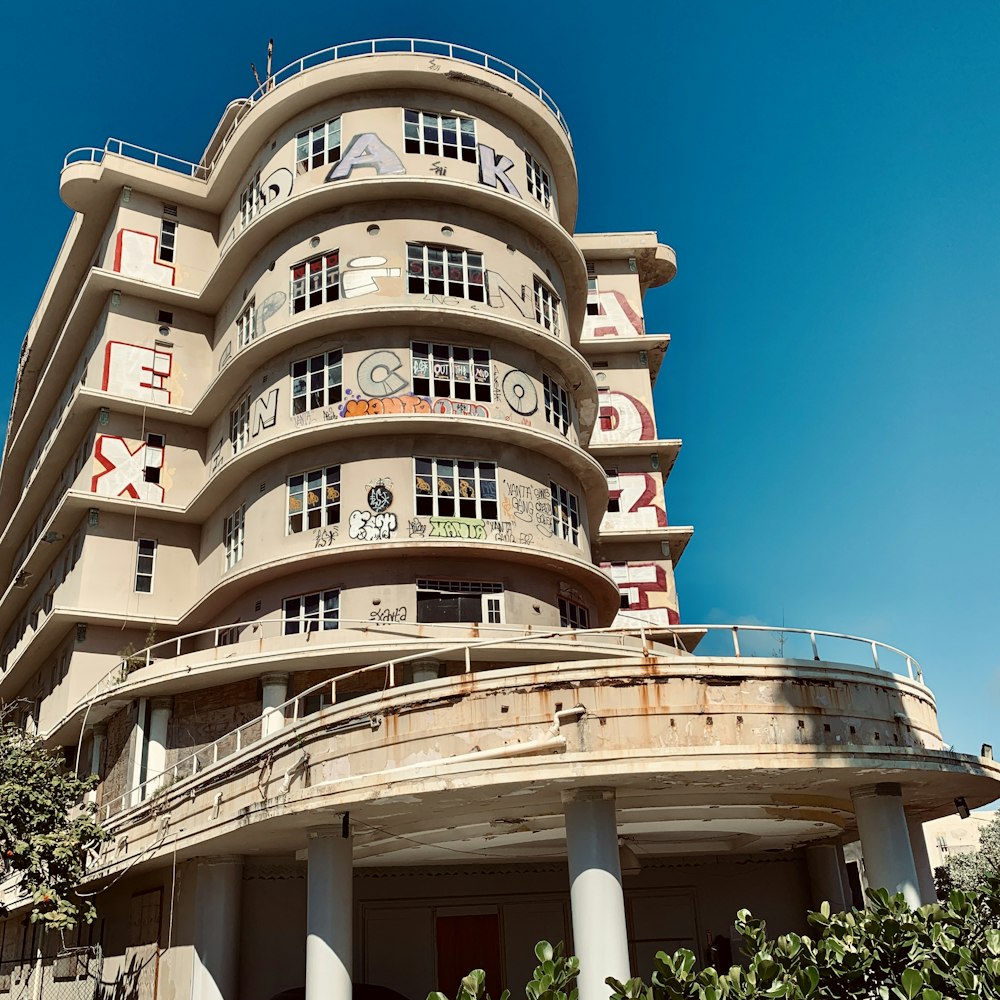 white and brown concrete building under blue sky during daytime