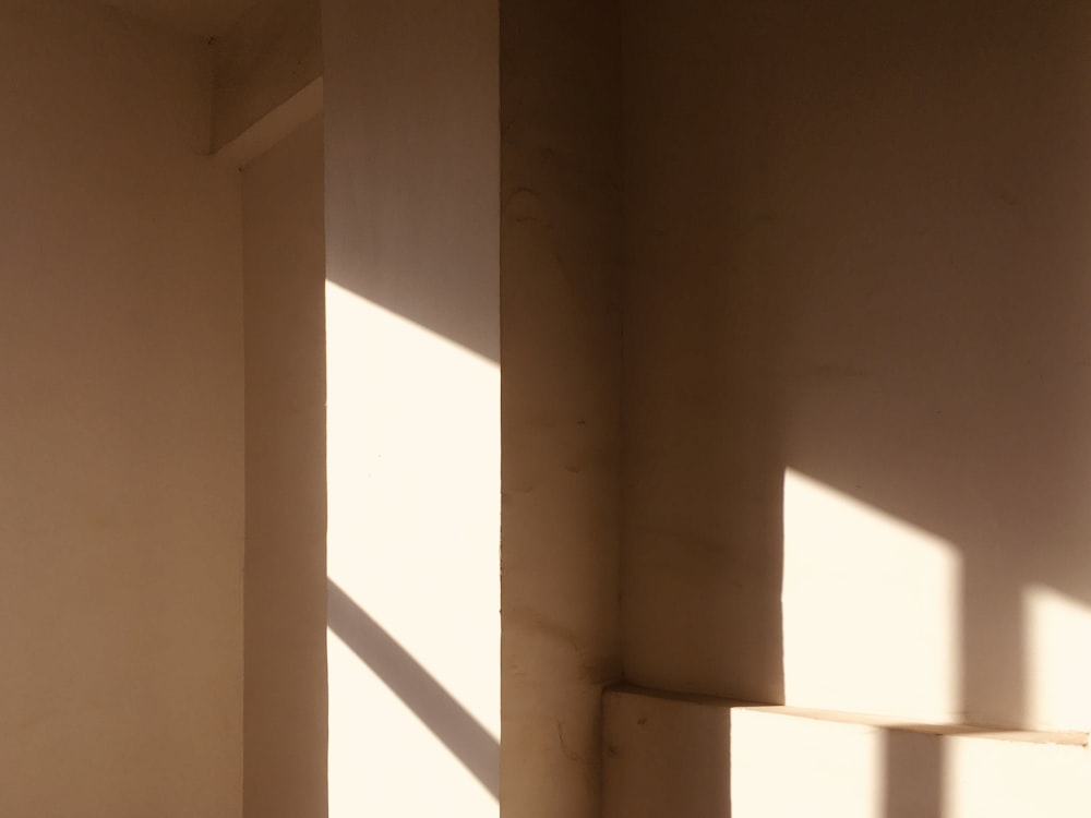 white concrete wall during daytime