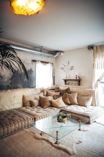 A cozy living room with a blend of beige and coffee tones.