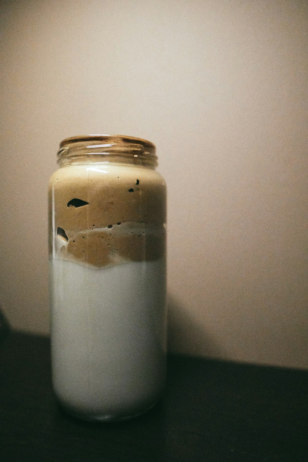 white powder in clear glass jar