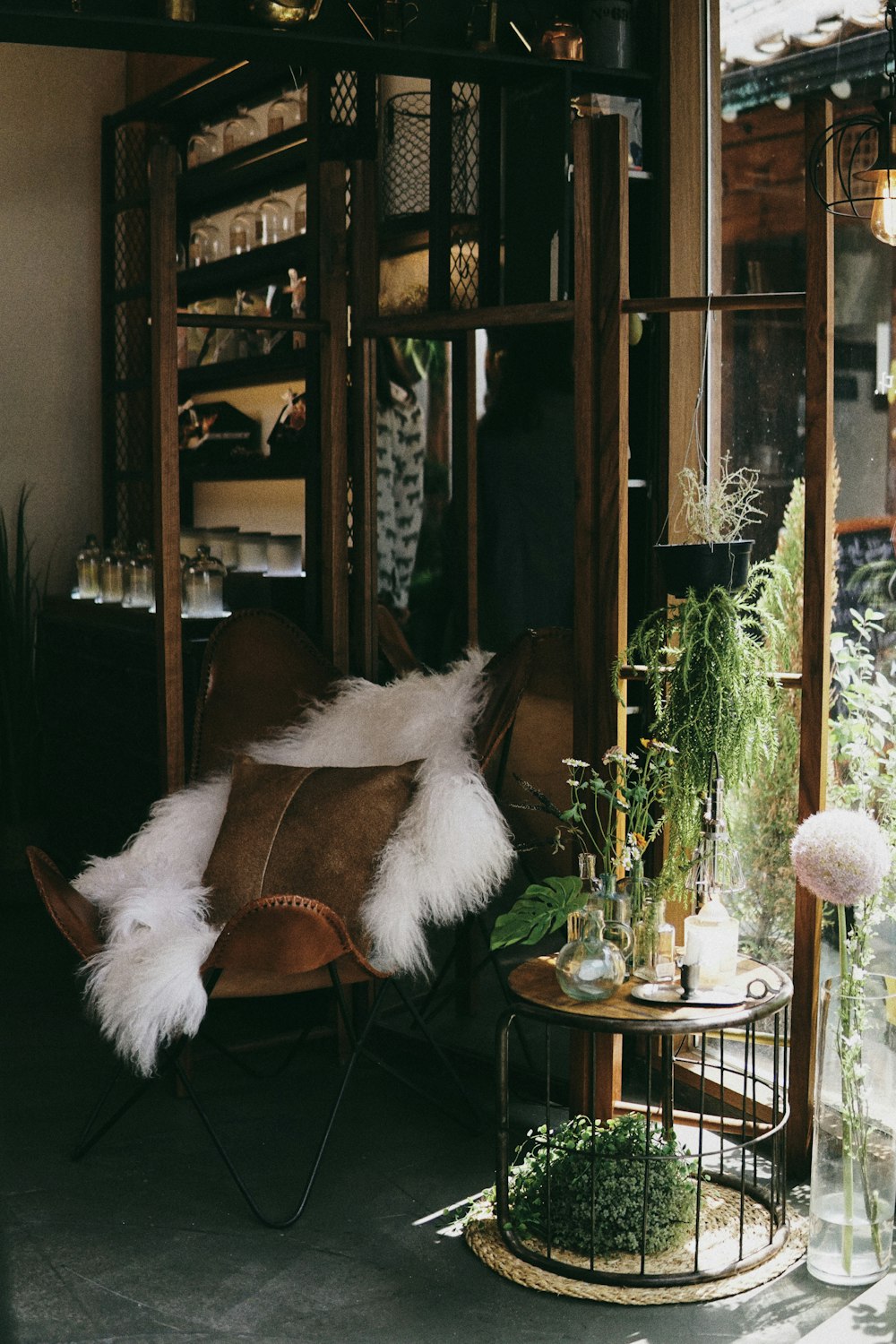 white and brown feather on brown wooden table