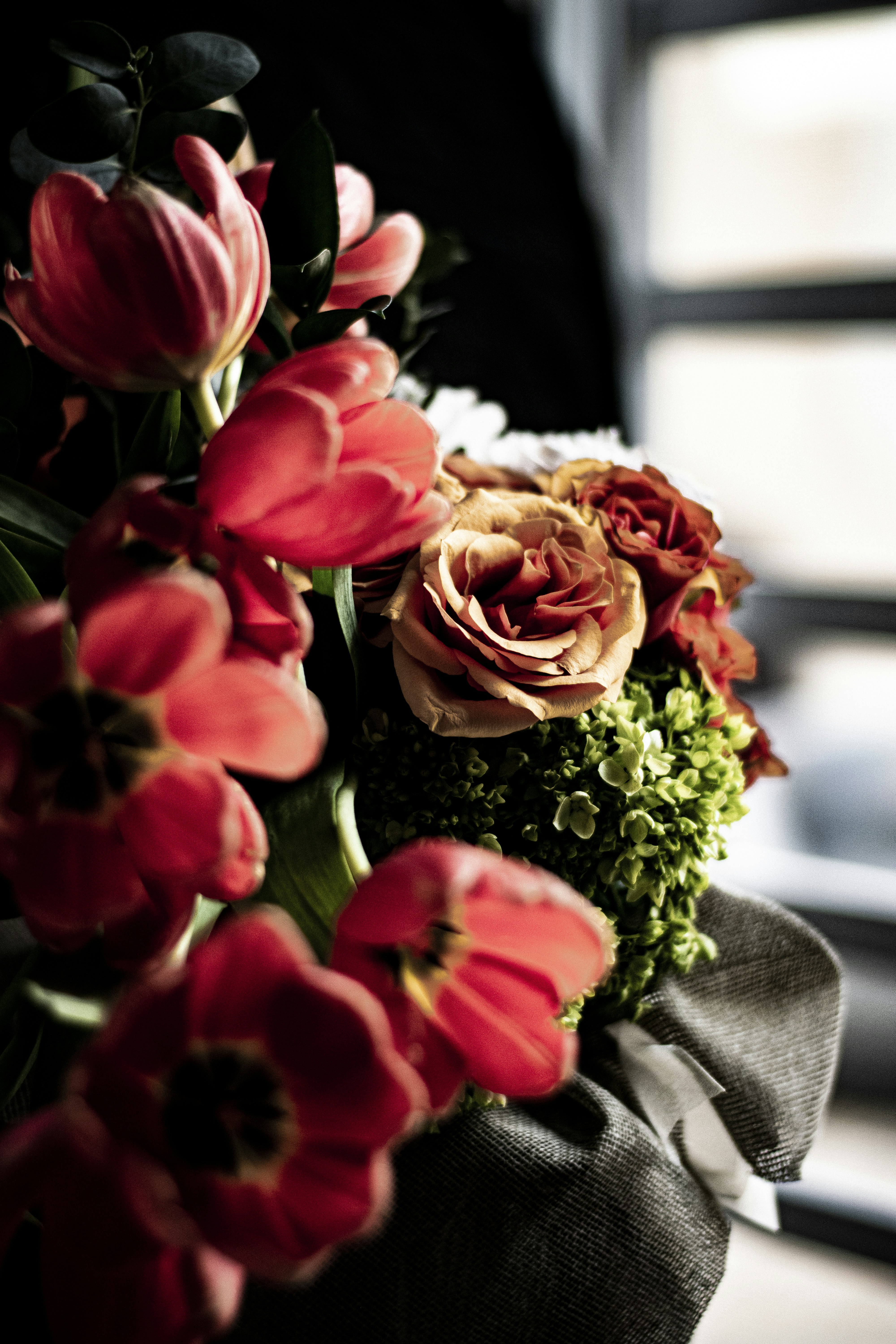 Pink And Green Flower Bouquet On Brown Concrete Wall Photo Free Plant Image On Unsplash