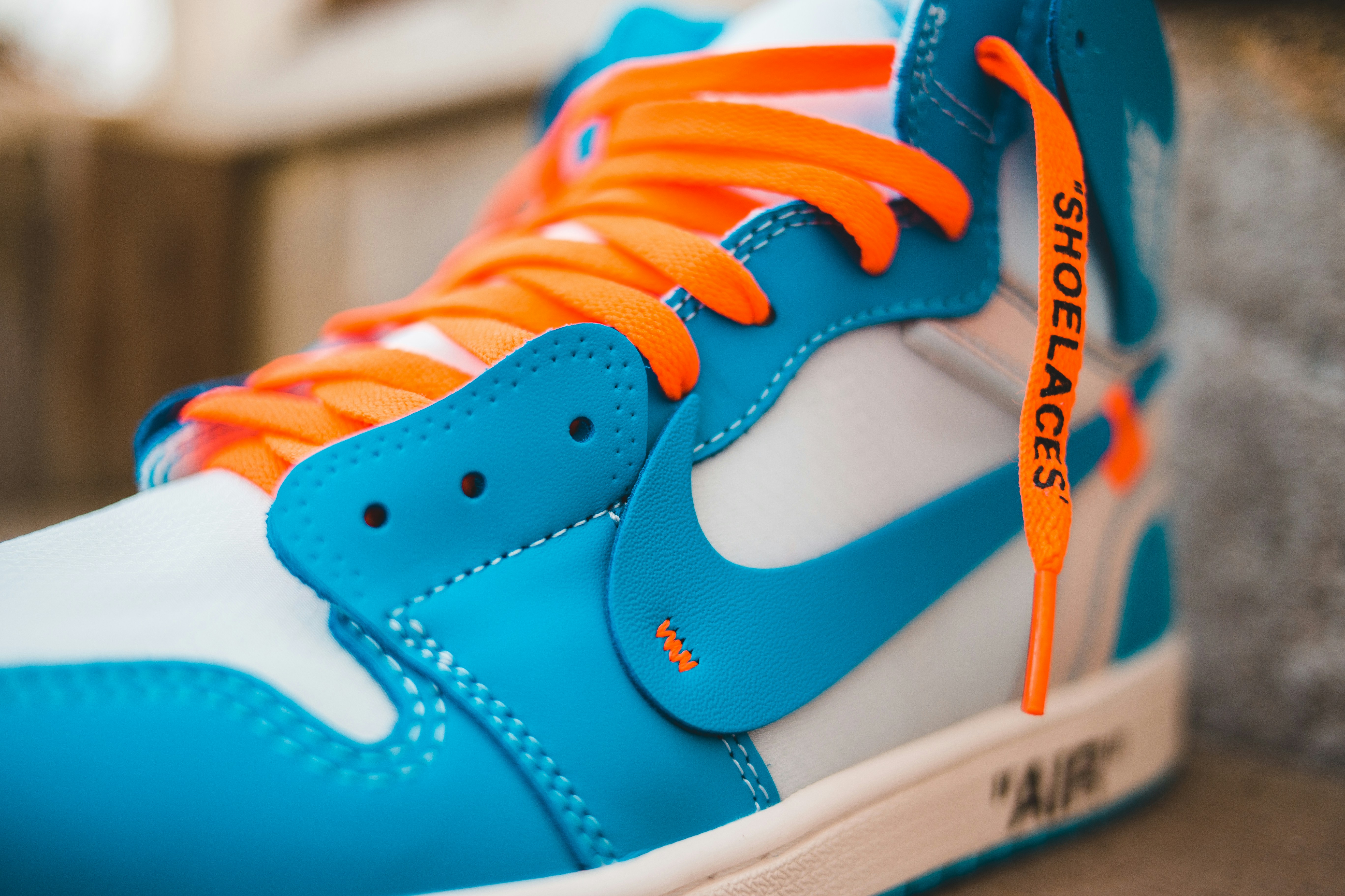 blue and white and orange jordan 1