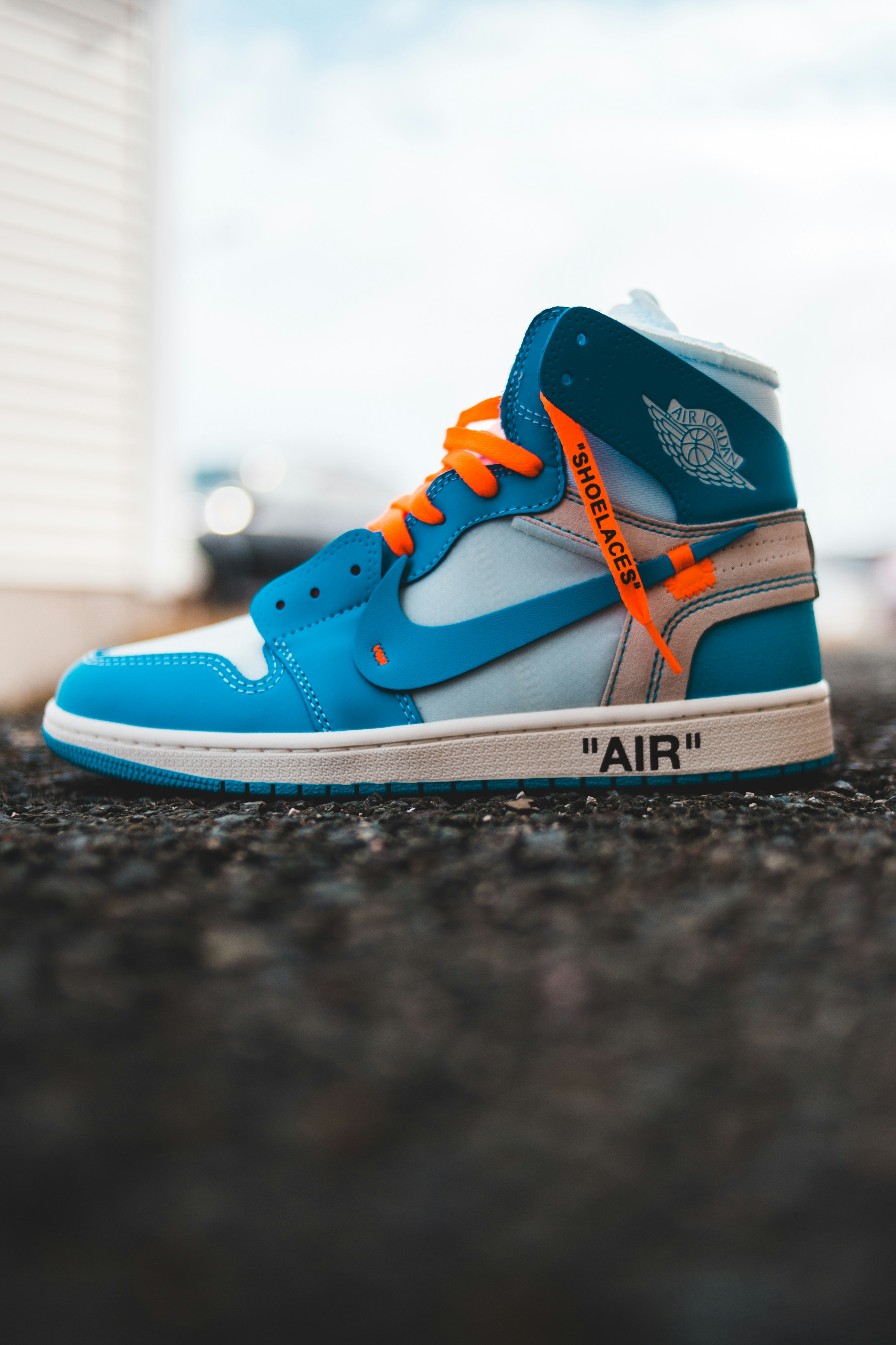 blue and orange nike high top sneakers 