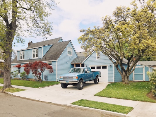 A pickup truck on a residential driveway