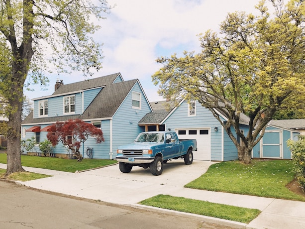 A pickup truck parked on a residential driveway