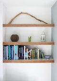 books on brown wooden shelf