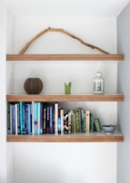 books on brown wooden shelf