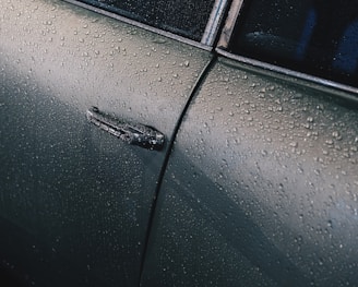 black car with white and black car