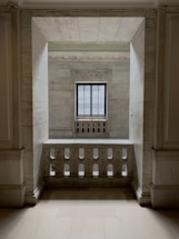 Elegant workspace with marble textures and soft golden light reflecting a calm, inspiring atmosphere.
