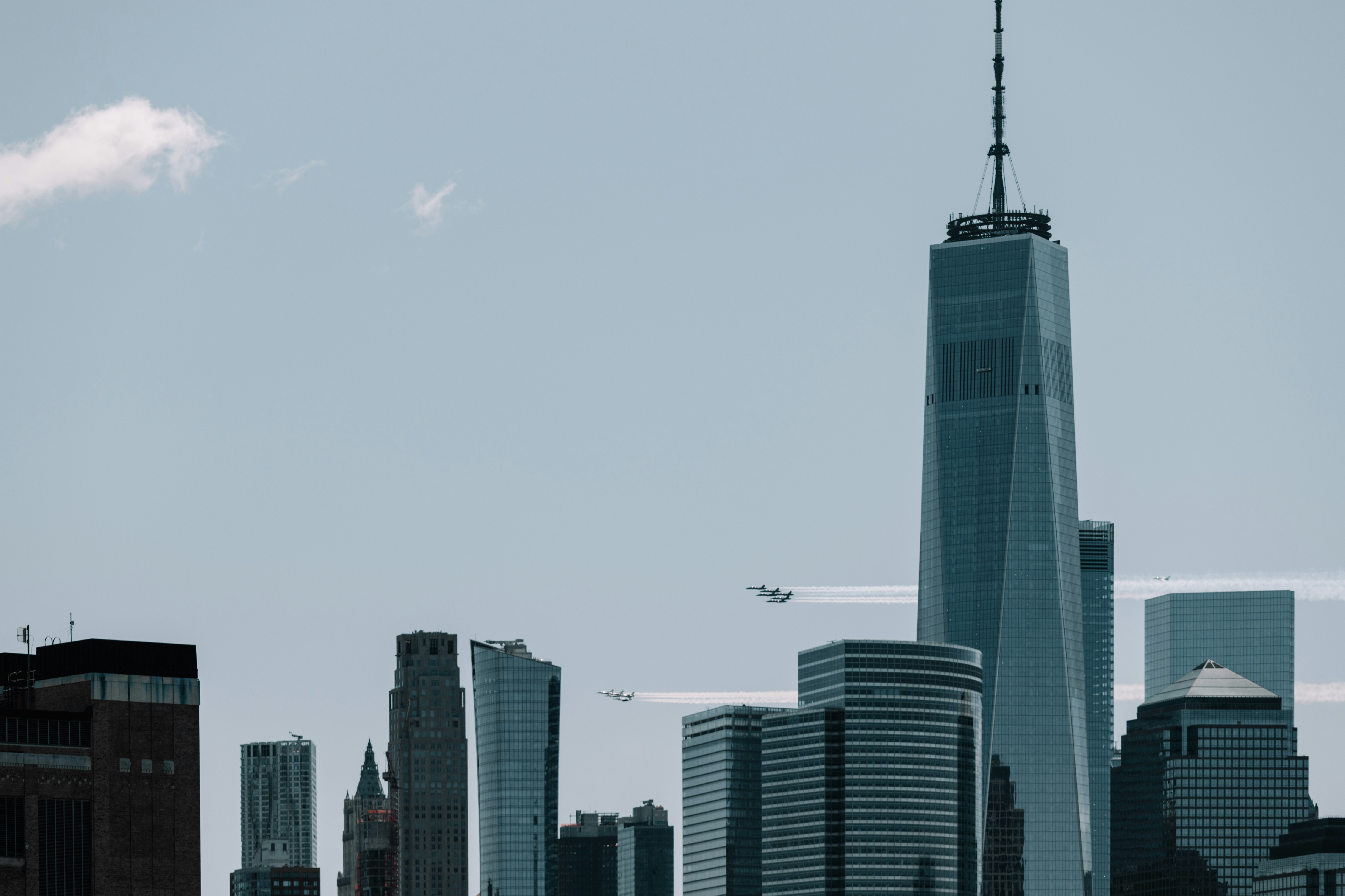 white and blue high rise buildings during daytime