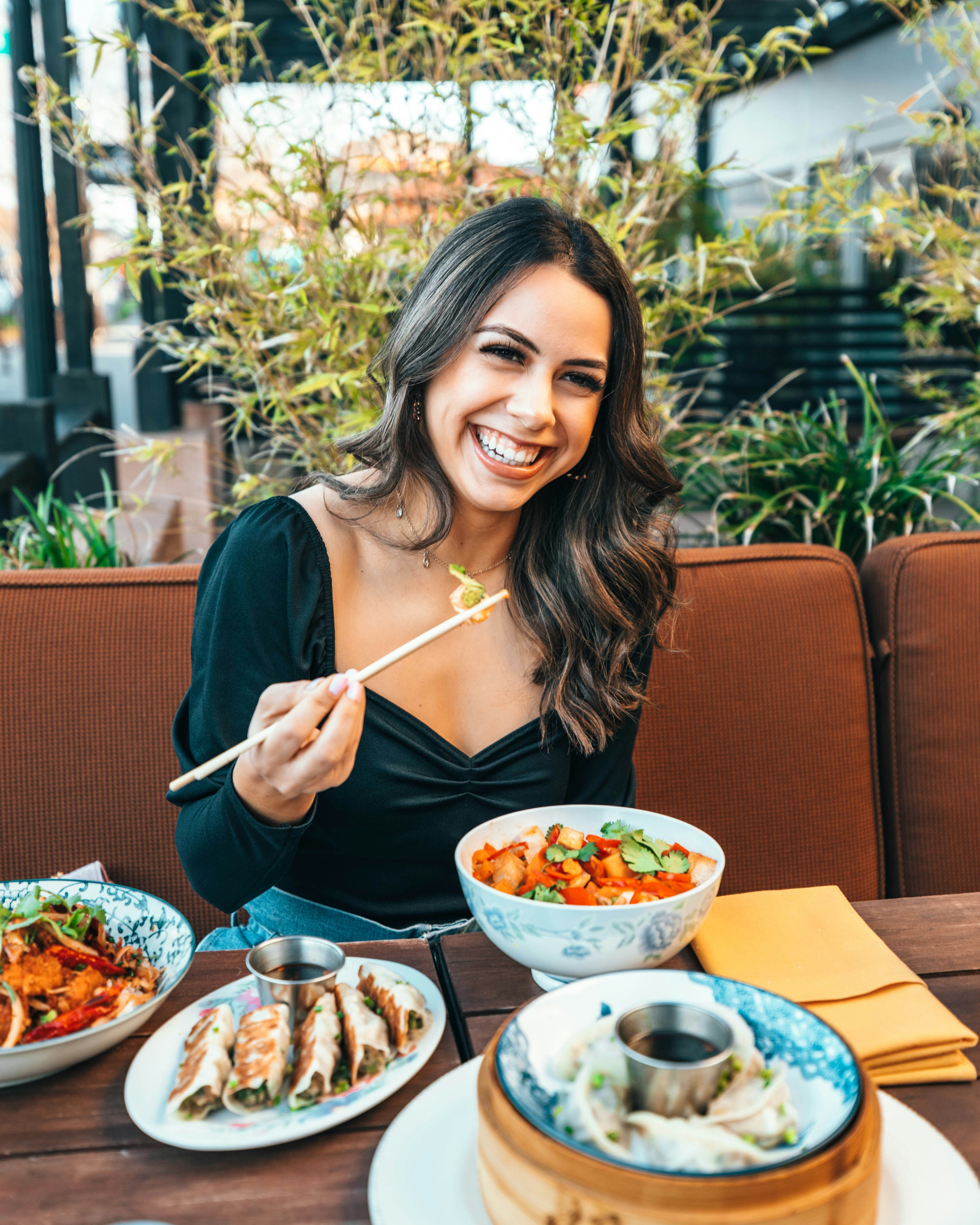 great photo recipe,how to photograph woman in blue long sleeve shirt holding chopsticks