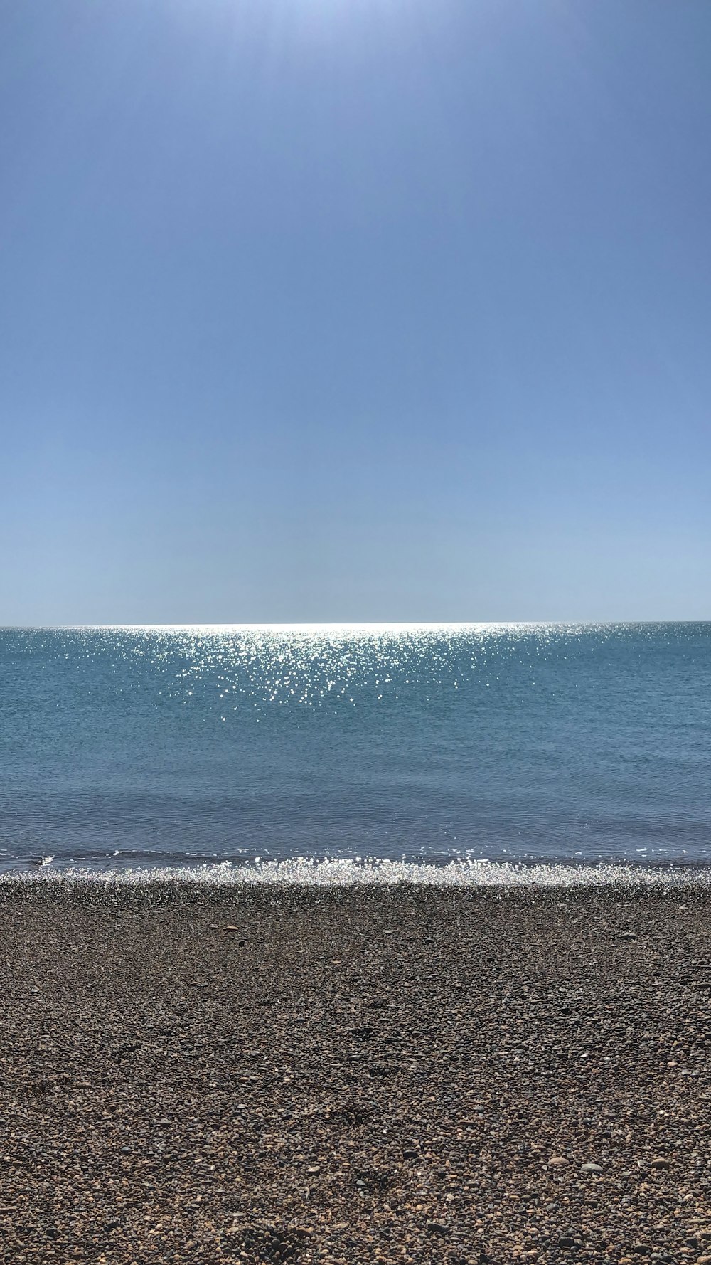 blue sea under blue sky during daytime