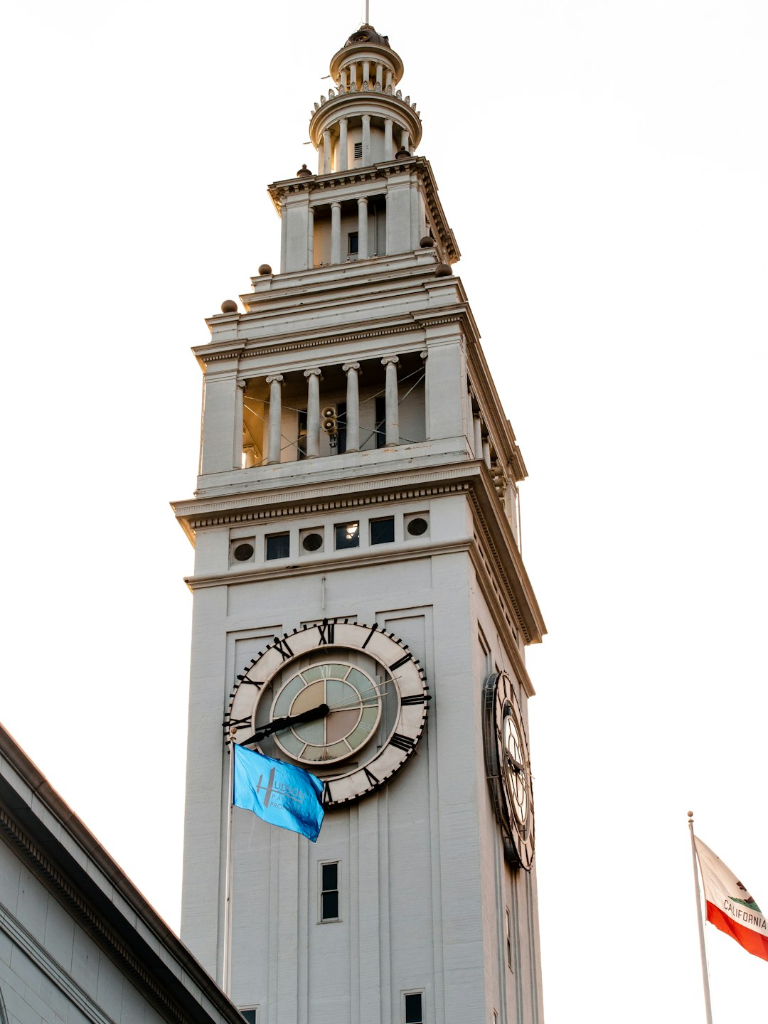 white and blue tower clock