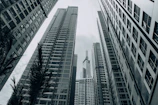 grayscale photo of high rise buildings