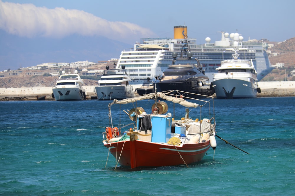 white and brown boat on sea during daytime