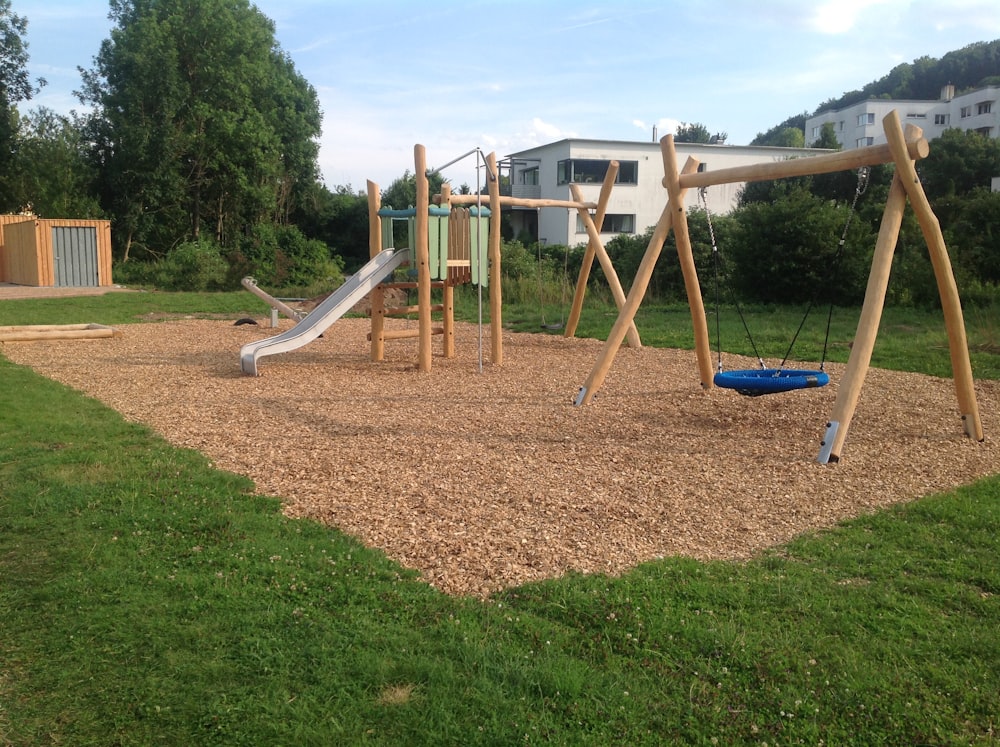 brown and blue playground swing