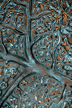 Close-up of a futuristic neural network interface glowing in midnight navy and bronze.