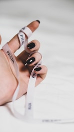 person wearing white and black sandals