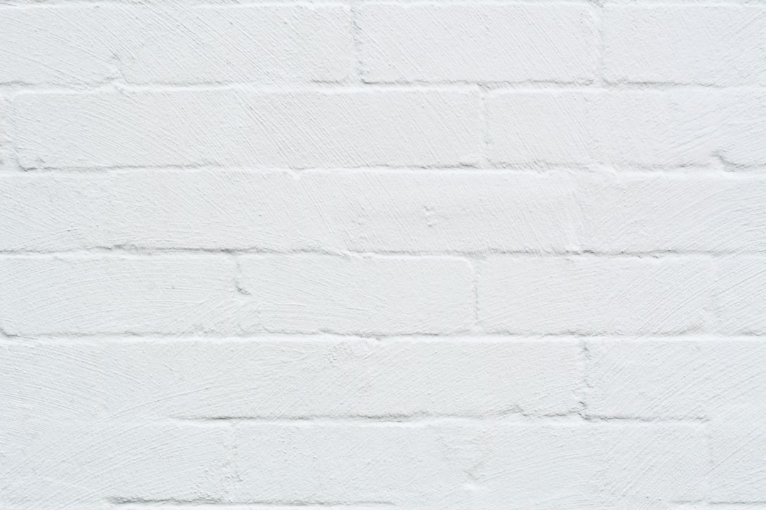 white concrete wall during daytime