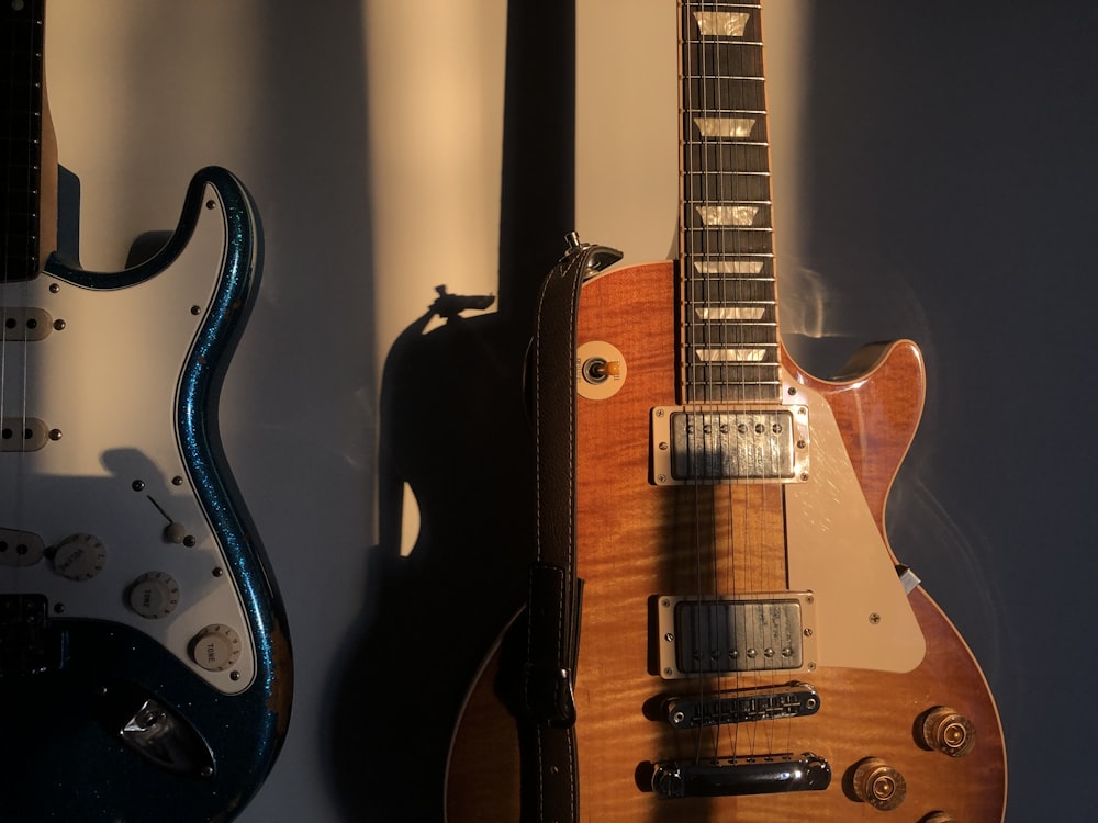 brown and black electric guitar