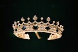 An intricate bridal tiara adorned with gemstones and floral motifs.