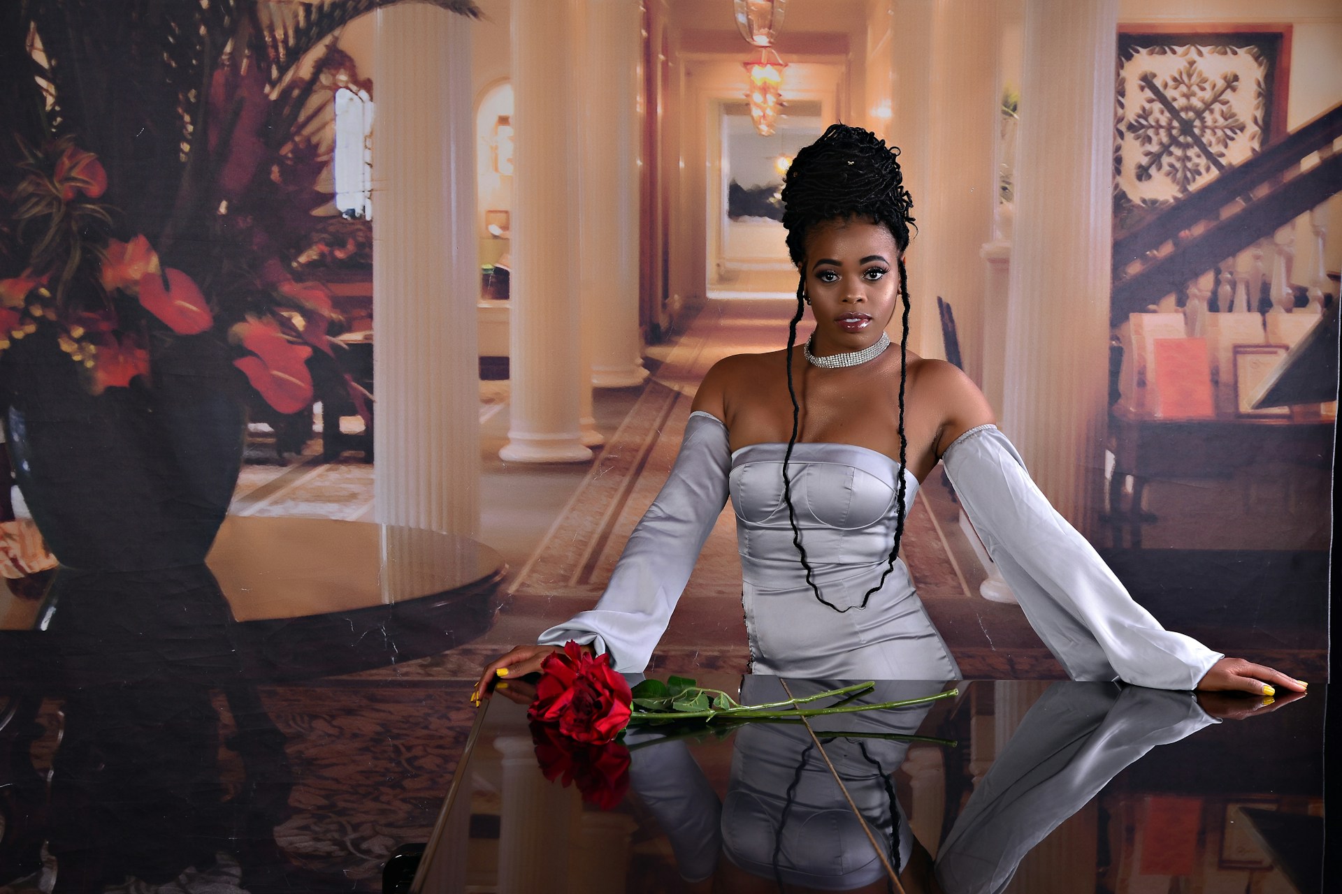 person wearing grey knit sweater