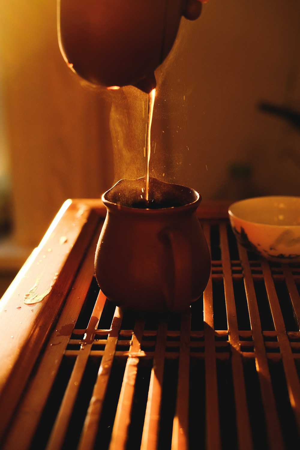 brown ceramic pot with white powder