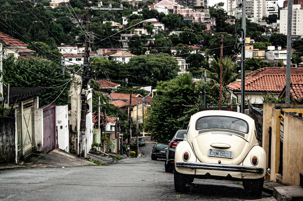 white car parked on the side of the road