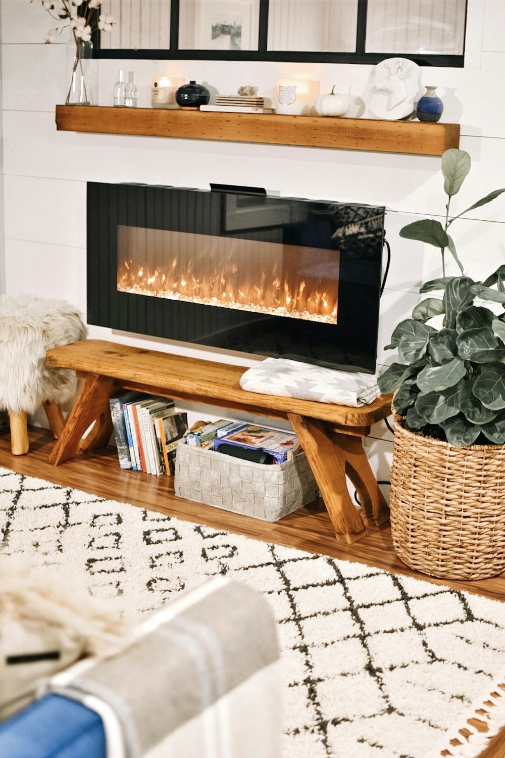 black flat screen tv turned on on brown wooden tv hutch