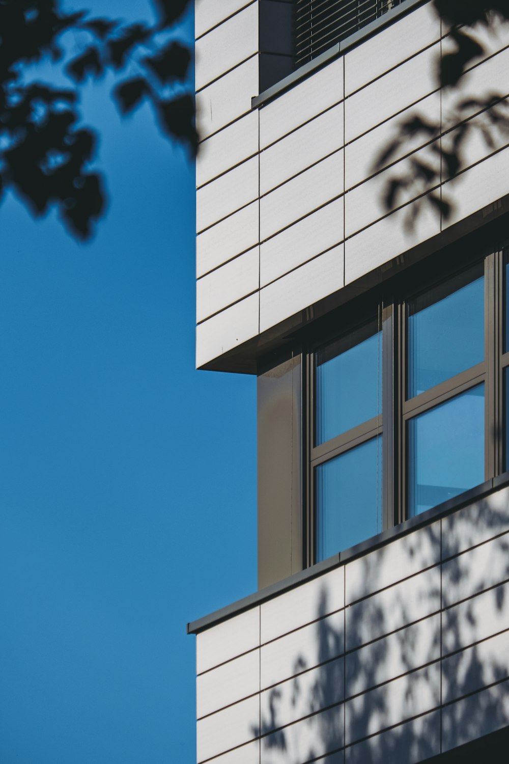 white concrete building under blue sky during daytime