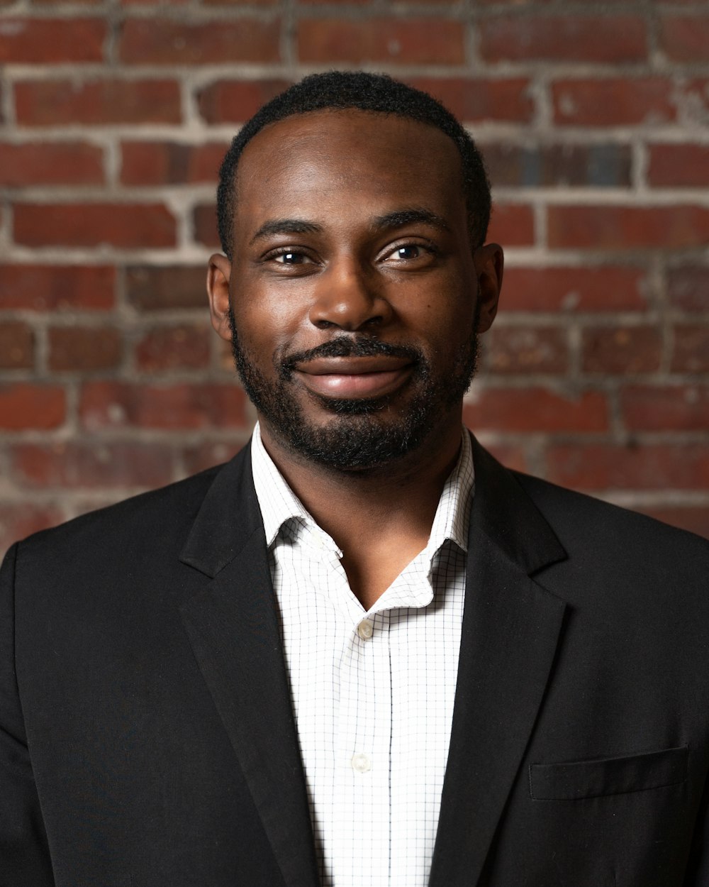 man in black suit jacket