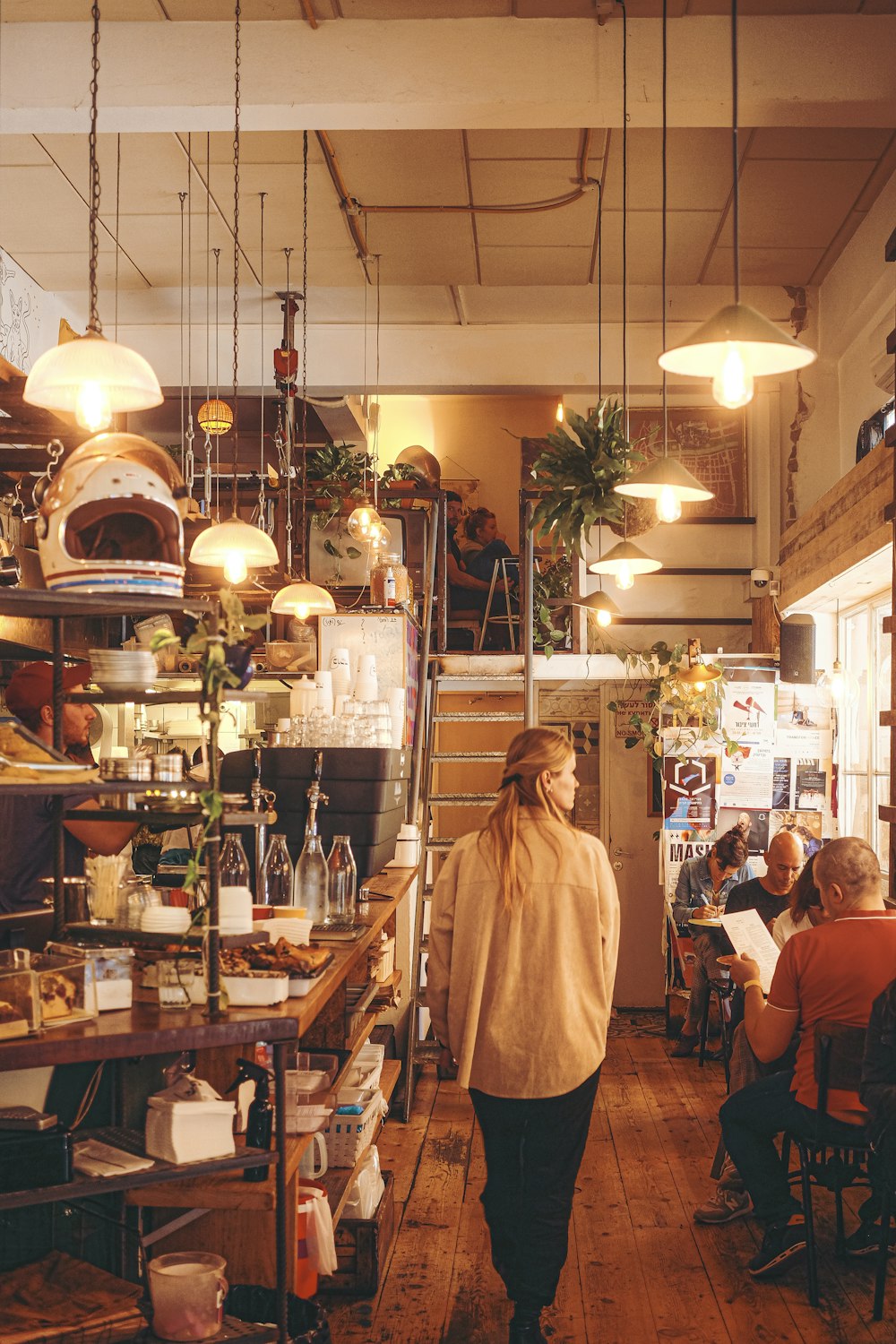 people sitting on chair inside restaurant