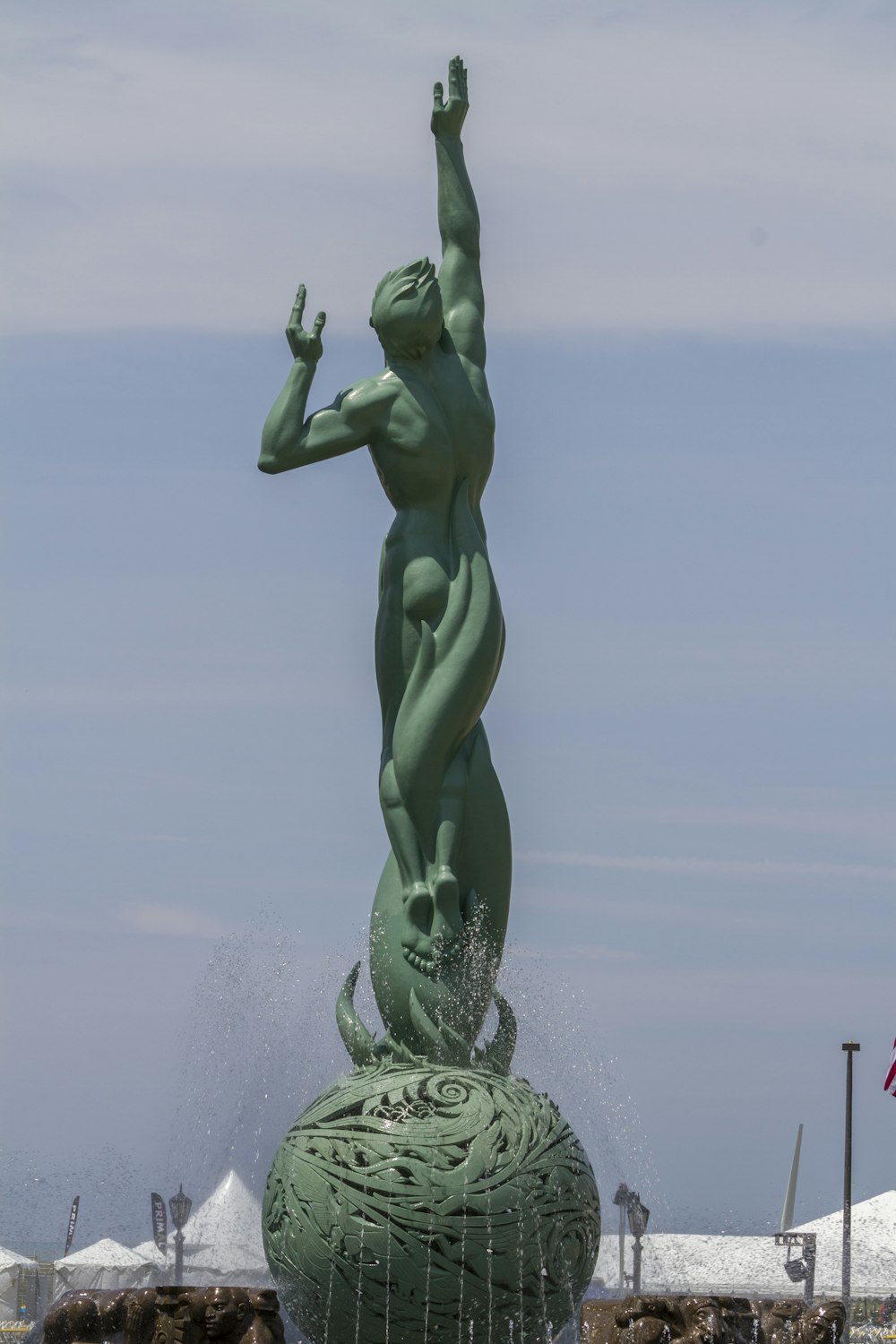 statue of liberty under blue sky during daytime