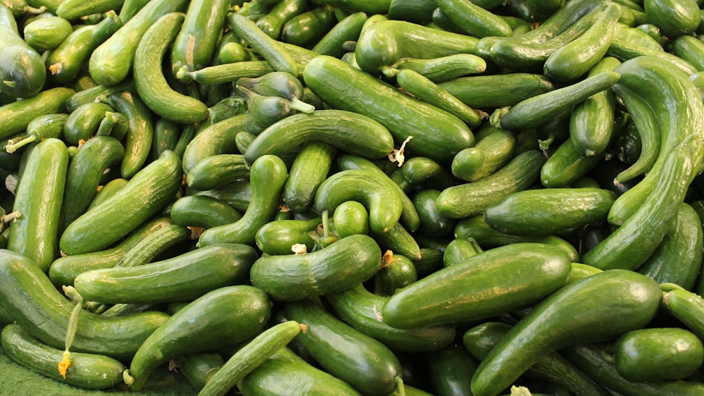 green vegetable on brown wooden table