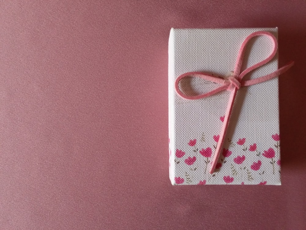 white and red heart print gift box