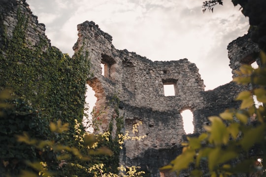 brown brick building under white clouds during daytime in Samobor Croatia