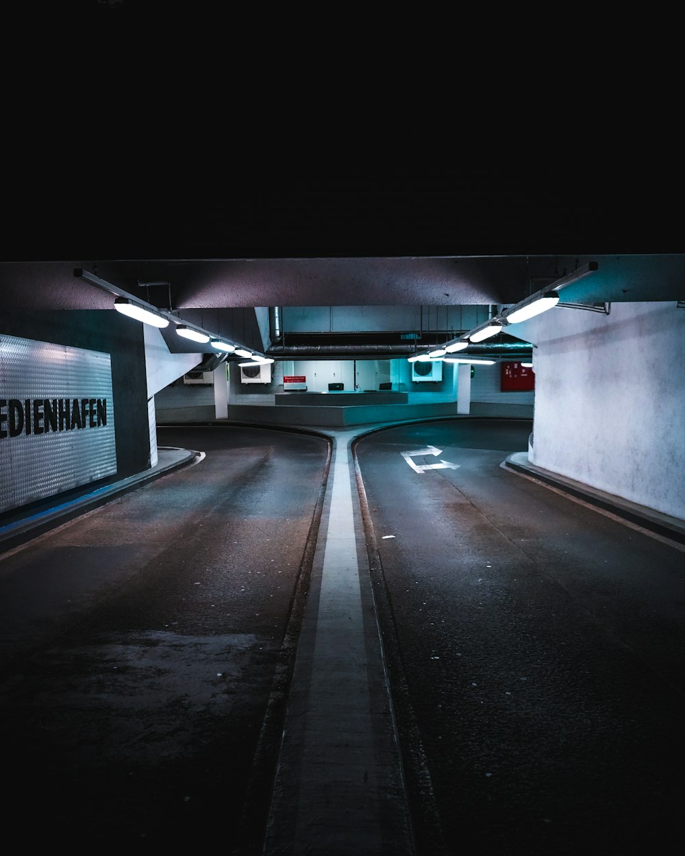 white and green train on tunnel