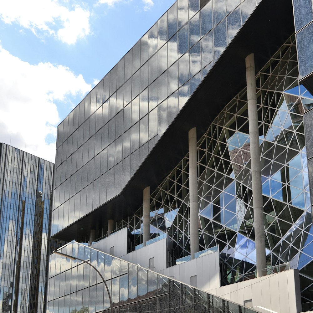 white and black concrete building under blue sky during daytime