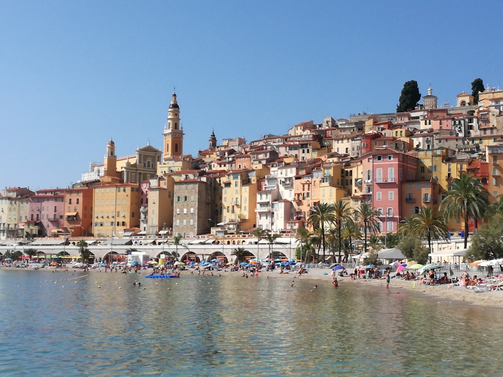 boats on water near buildings during daytime